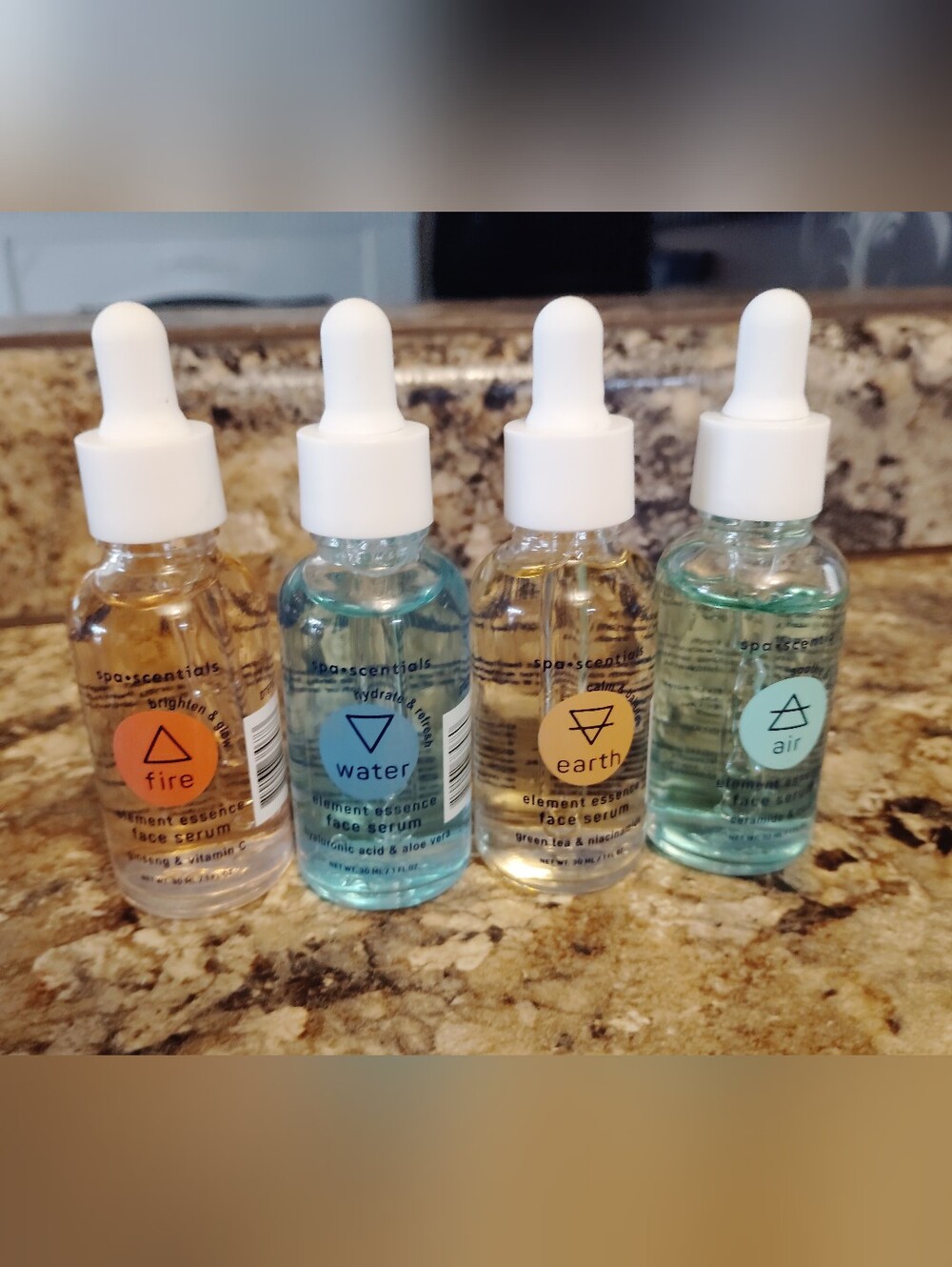 Fire water Earth and Air hydrating facial serum. Set of four $15